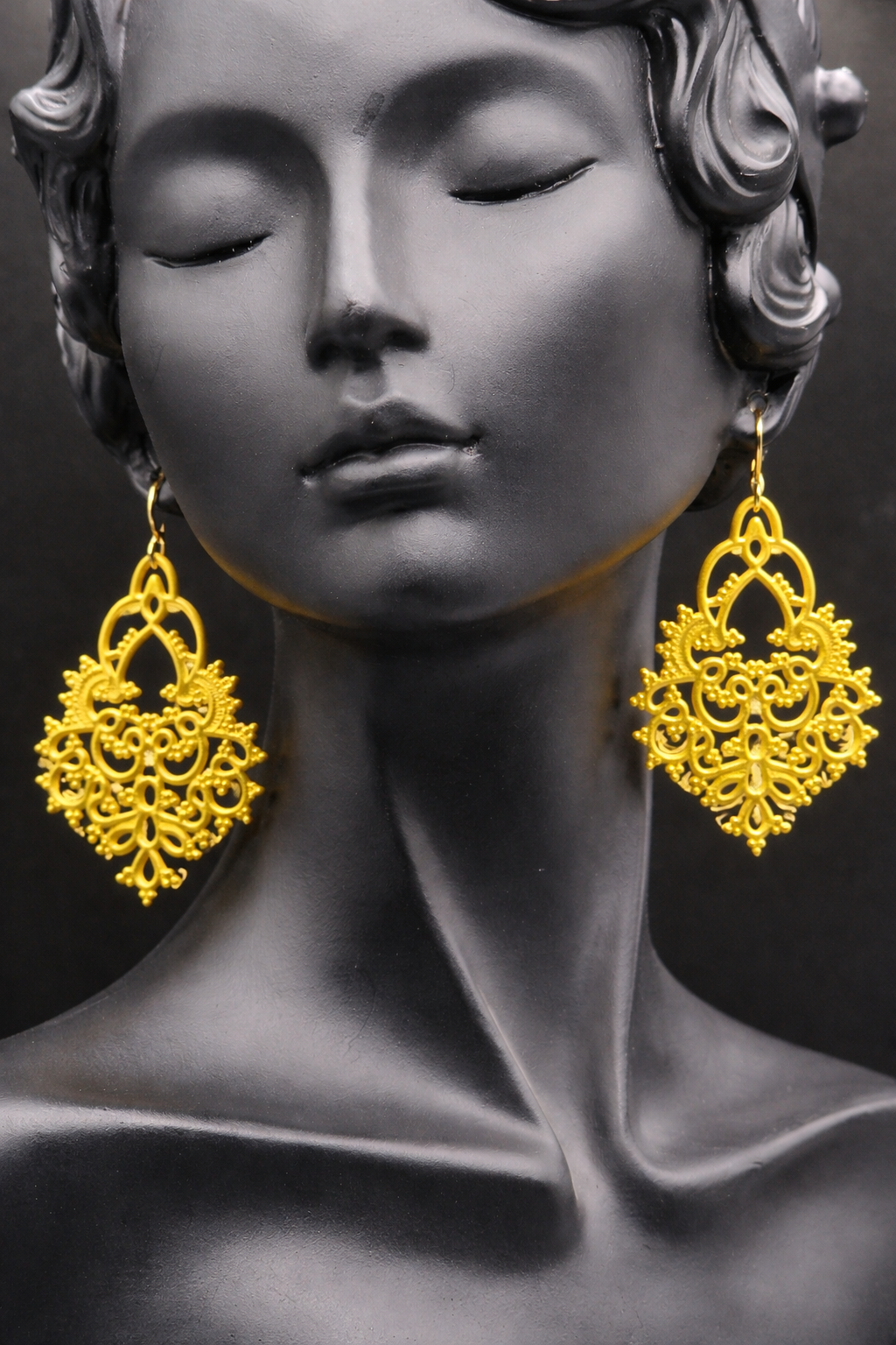 Accessorize your look with these stunning yellow dangling earrings!