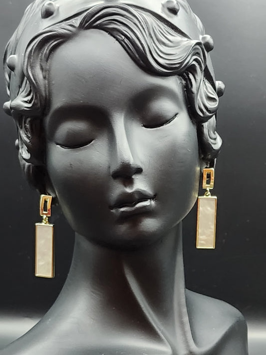White gold tone dangling earing