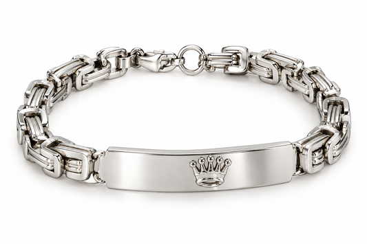 Add a bold finishing touch to your style with the Men’s Silver-Tone Crown Link Bracelet from PSK ELEGANCE.