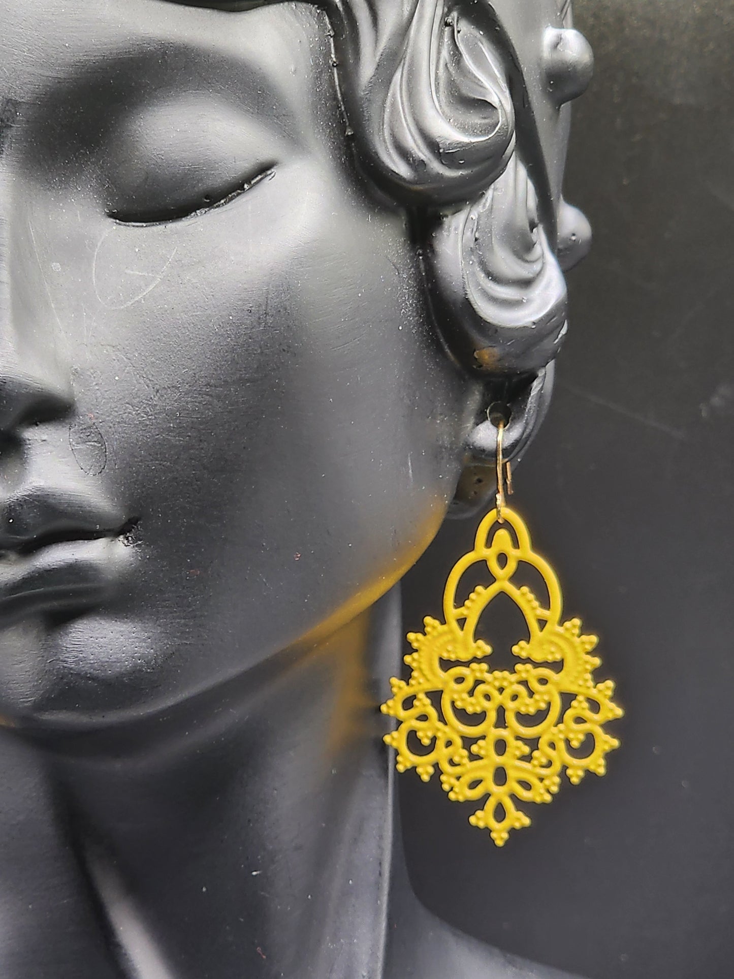 Accessorize your look with these stunning yellow dangling earrings!
