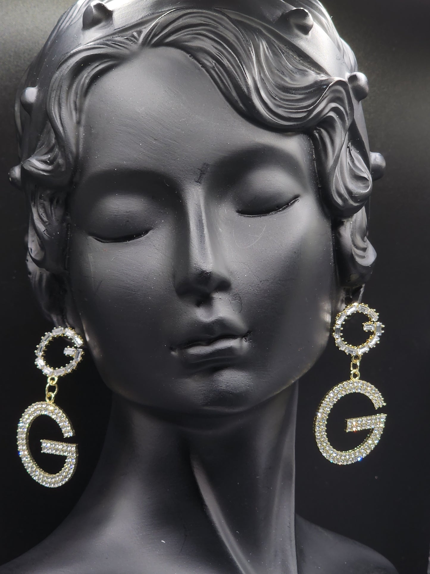 These statement “G” earrings