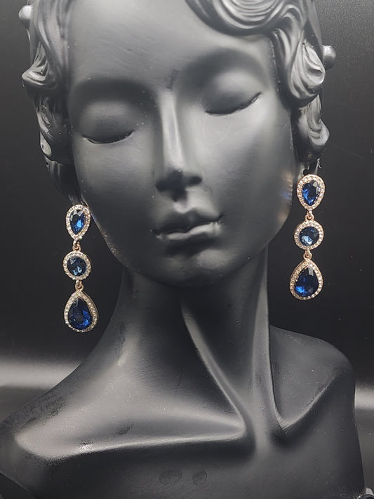 Blue Crystal Drop Earrings
Elegant, timeless, and effortlessly glamorous — the perfect finishing touch for any occasion.