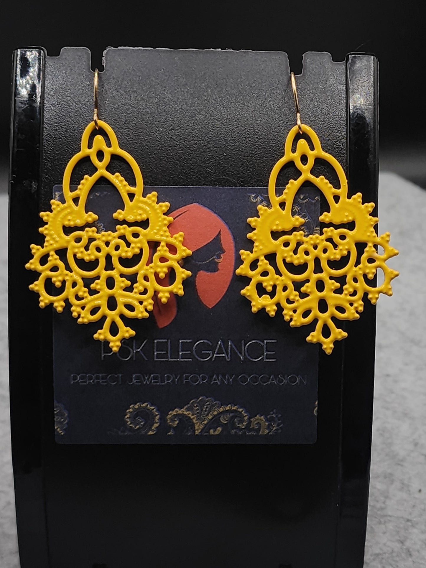 Accessorize your look with these stunning yellow dangling earrings!
