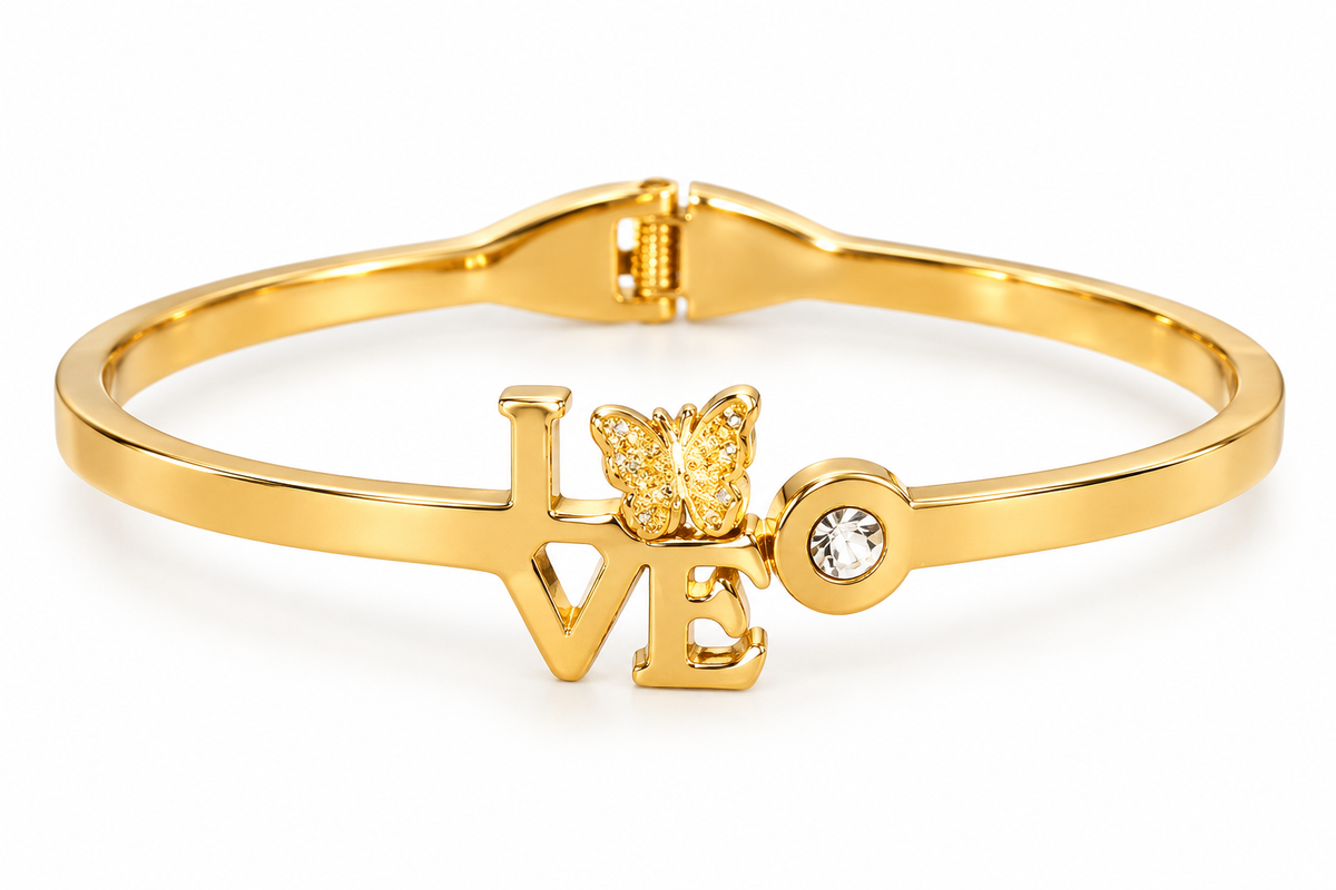 Celebrate love and elegance with the Gold-Tone LOVE Butterfly Crystal Bangle from PSK ELEGANCE.