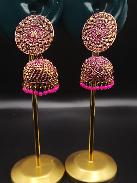 PSK ELEGANCE Gold Jhumka Earrings with Pink Bead Detailing