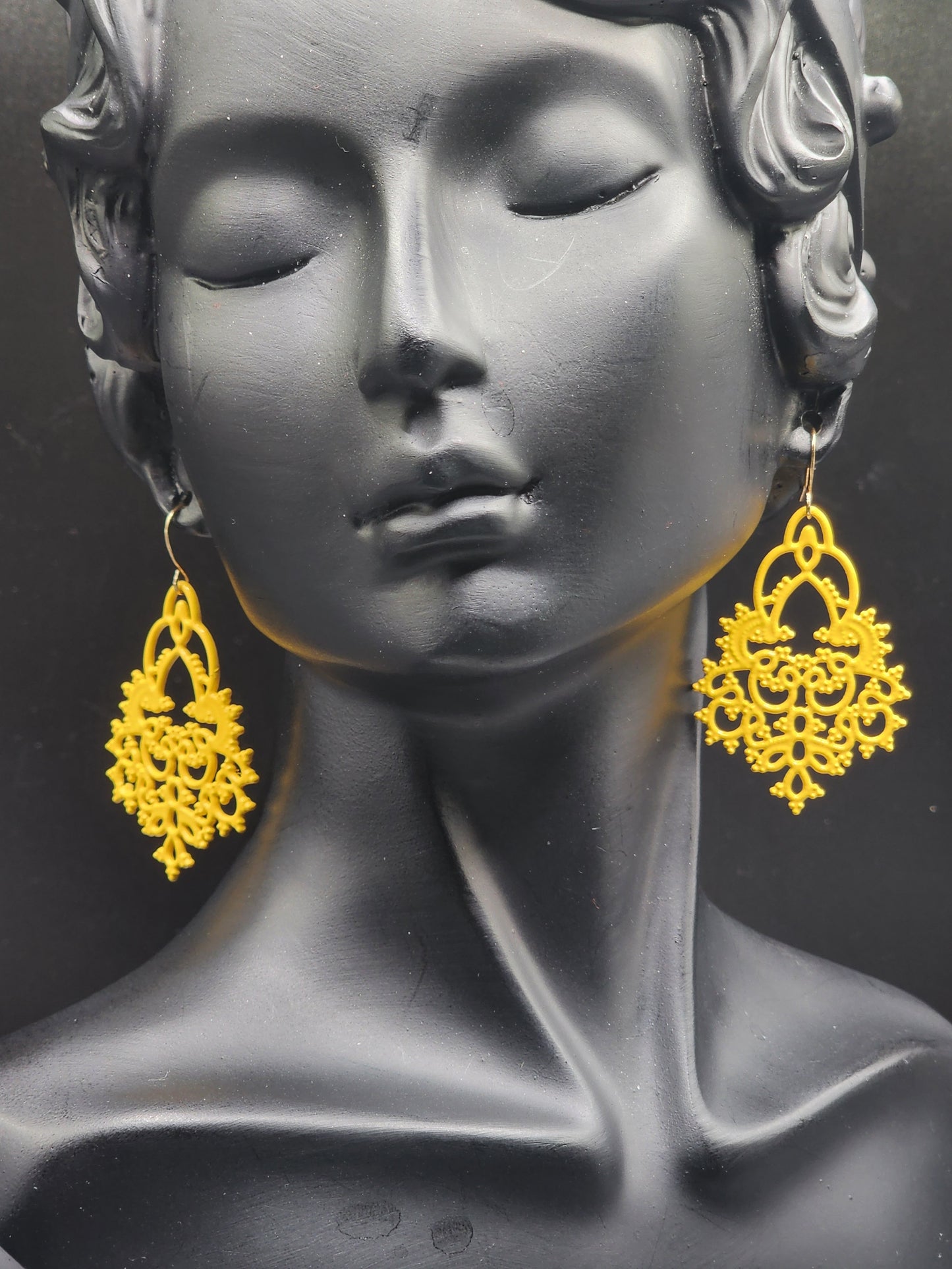Accessorize your look with these stunning yellow dangling earrings!