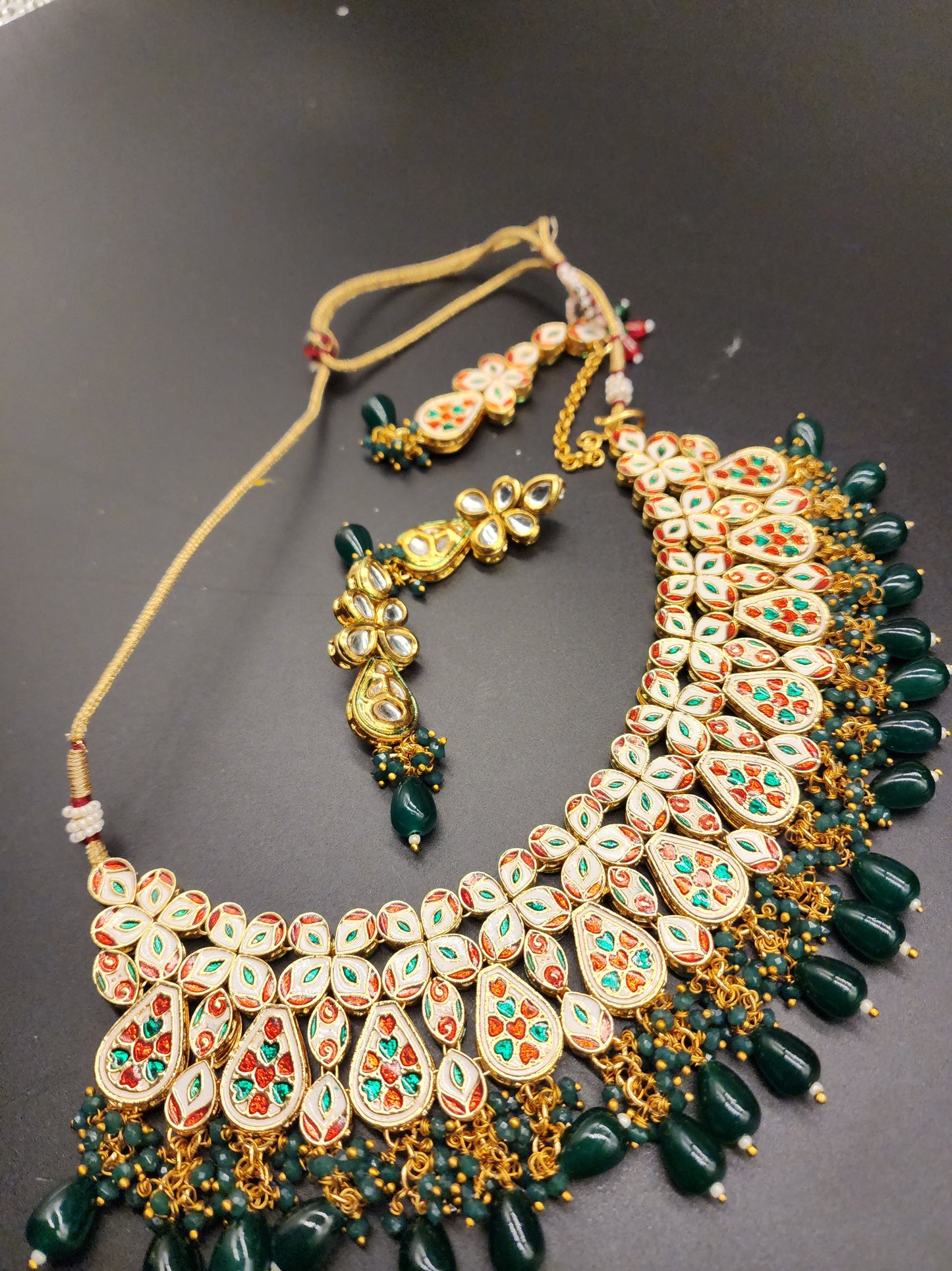 Traditional Elegant Necklaces, beautifully paired with matching earrings and stunning tikka.